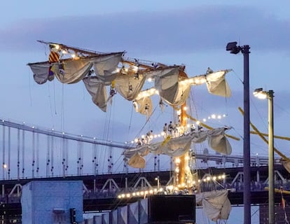 Sailors hang on the masts of the Cuauhtémoc, in New York.