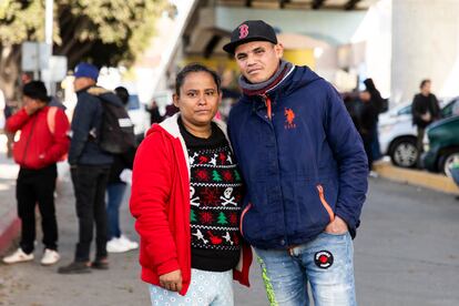 María de los Ángeles and Carlos Andrés at the El Chaparral checkpoint on the Tijuana-San Diego border.