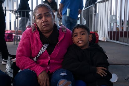 51-year-old Venezuelan migrant Zoila Romero waits with her family outside the Tijuana checkpoint.