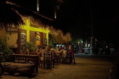 Tourists at a bar in Mazunte, Oaxaca, Mexico, on March 8, 2025.