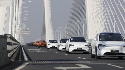 Dozens of Chery cars cross the bridge over the Yangtze River in the Chinese city of Wuhu on March 18.