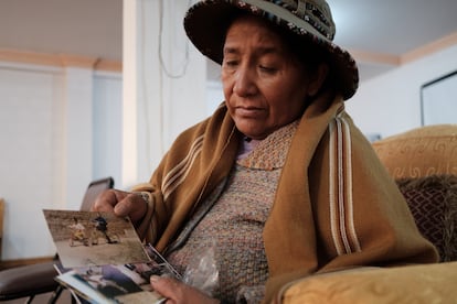 Doña Lidia looks at a photo of her daughter Juliva, who disappeared on July 10, 2014, when she was on her way to university.